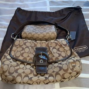 Coach purse with cosmetic case.
